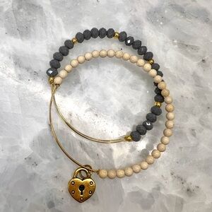 Set of 2 beaded bangle bracelets with heart charm